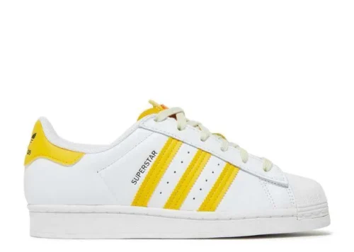 adidas-superstar-white-lazy-yellow.webp ADIDAS SUPERSTAR ‘WHITE LAZY YELLOW’